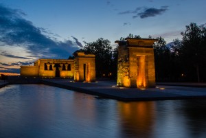 Egyptian temple with night illumination and sunset